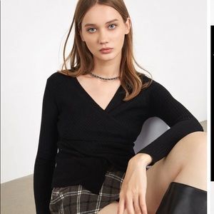 black crossover sweater